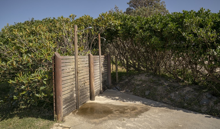 Outdoor shower facility at Point Plomer campground, Limeburners Creek National Park. Photo: John Spencer/OEH